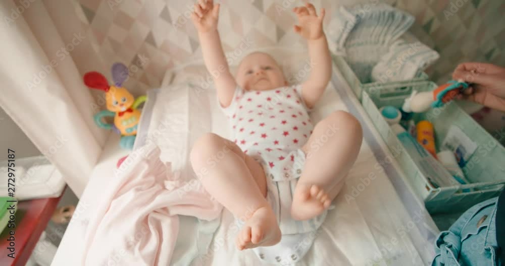 Baby Playing On The Changing Mat
