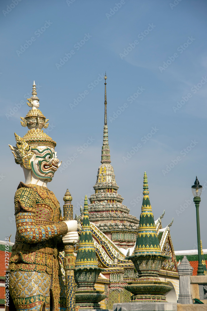 Fototapeta premium Demon guardians at the Temple of the Emerald Buddha, Grand Palace, Bangkok, Thailand