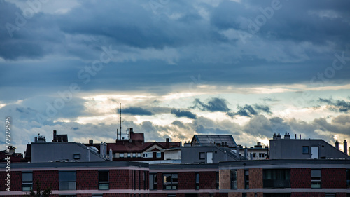 Rainy clouds travel over apartments buildings