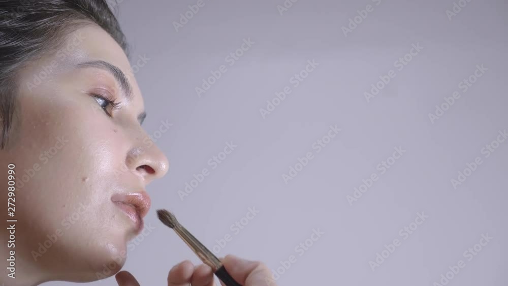 Close Up, Painting lips of woman model with Copy Space