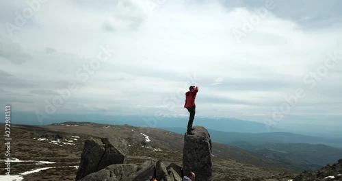 Man on top of Vitosha mountain, looking at the beautiful view.
