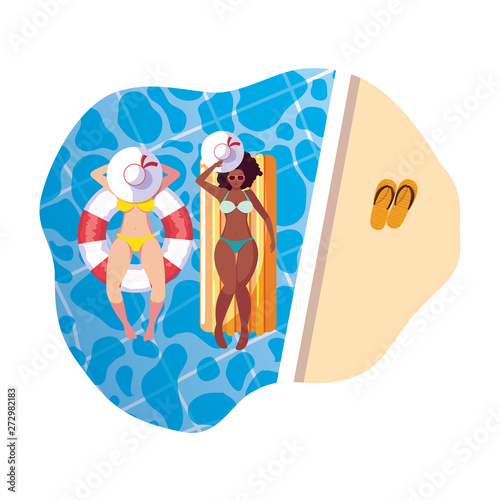 beautiful interracial girls with float mattress in water
