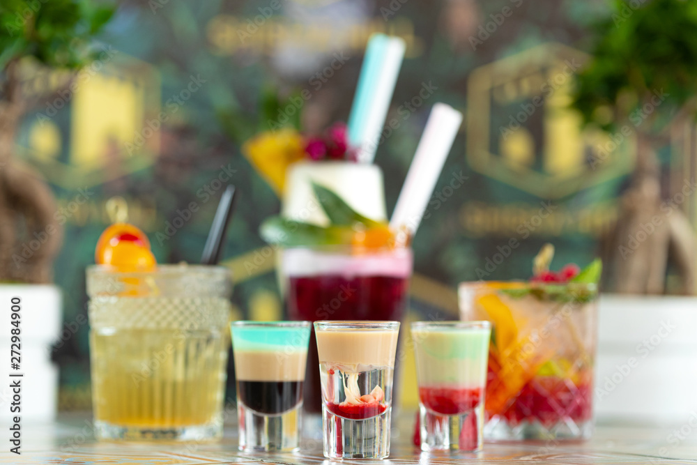 Colorful cocktails on top of the bar, summer coctails