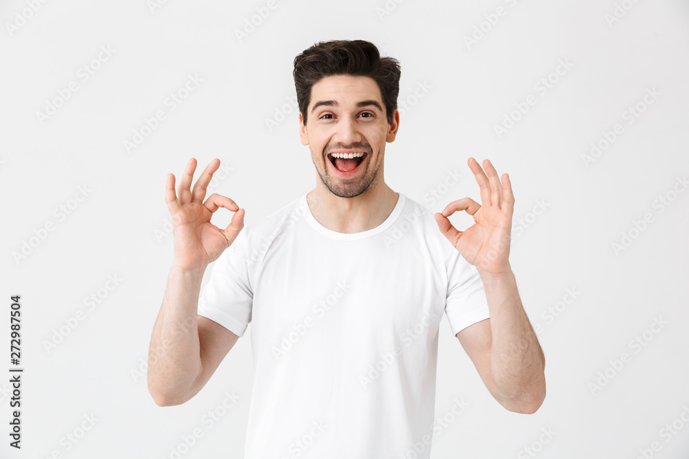 Full length portrait of a cheerful young man Full length portrait of a cheerful young man