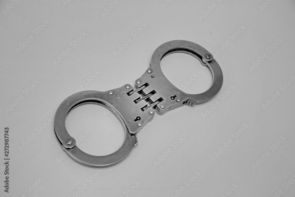 handcuffs on white background handcuffs on white background