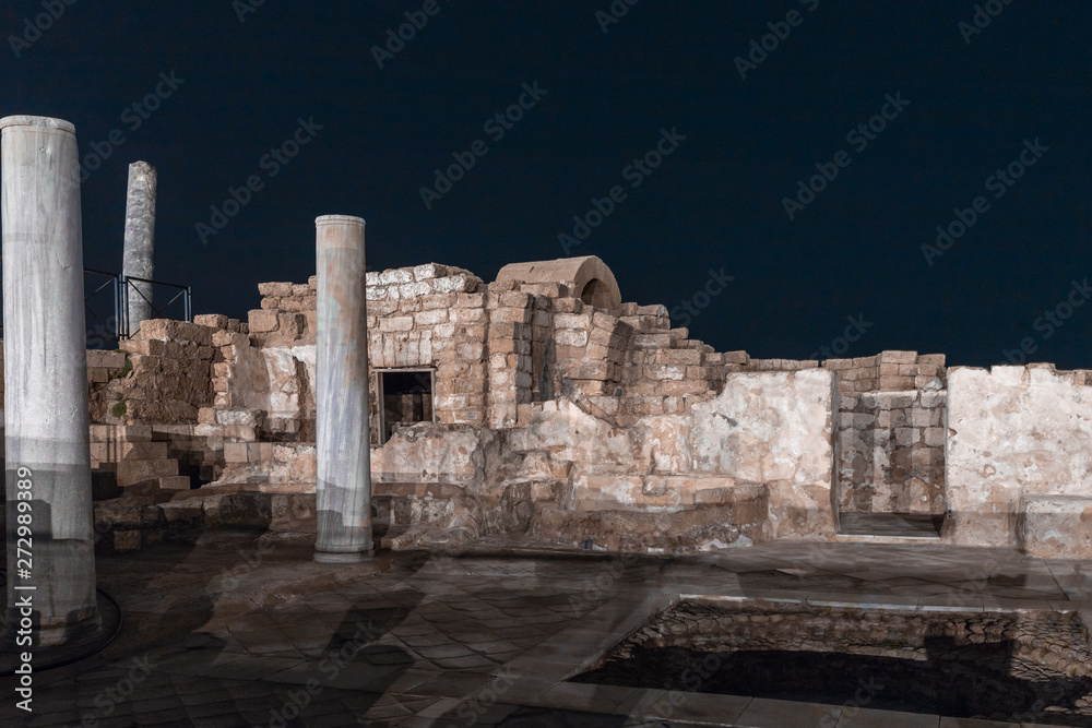 Night view of the ruins of Caesarea city on the Mediterranean coast, which was built by the king of Judea, Herod the Great, in honor of the Roman emperor Caesar Augustus
