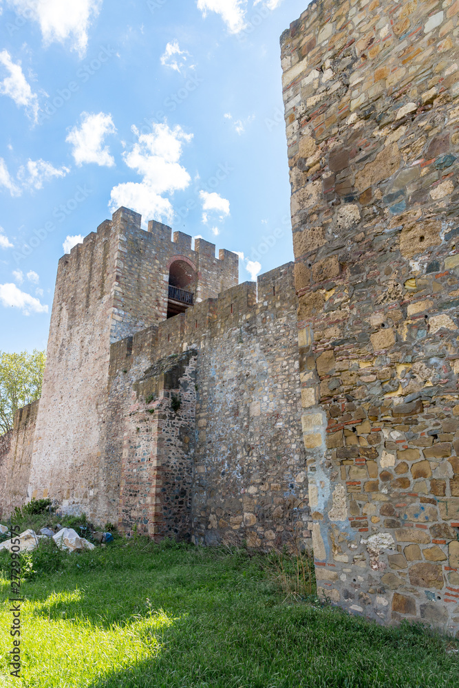 The remains  of the fortress wall and the clock tower in the ruins of the Smederevo fortress, standing on the banks of the Danube River in Smederevo town in Serbia.