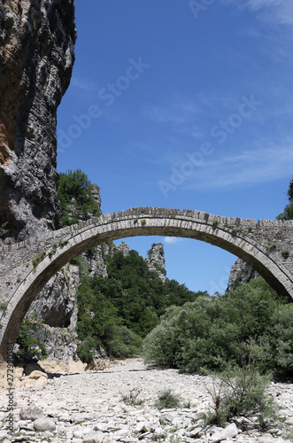 kokkori old stone bridge in summer landscape Zagoria Epirus Greece © goce risteski