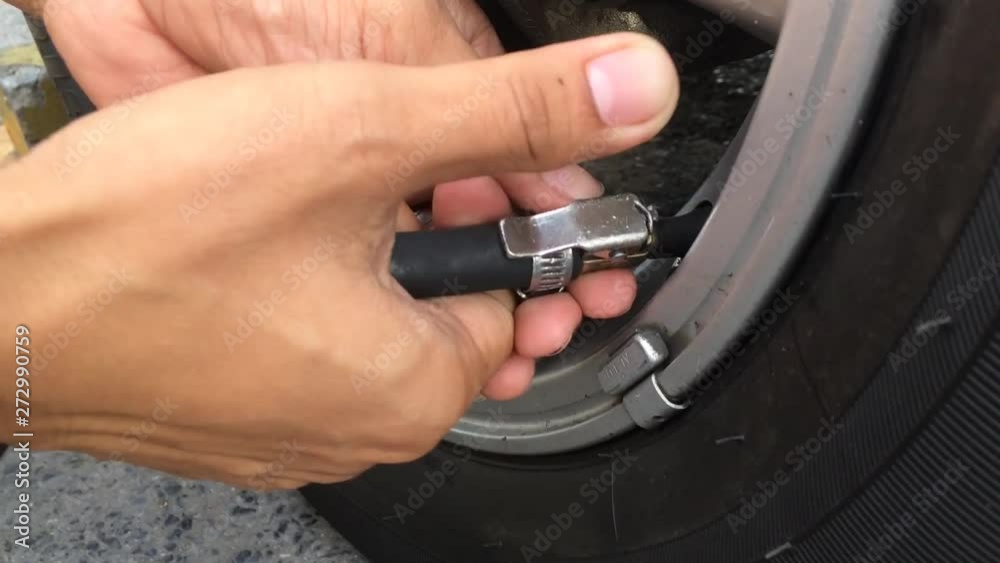 Filling air into car tire, vehicle auto maintenance Filling air into car tire, vehicle auto maintenance