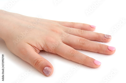 women s brush with a beautiful manicure on white background