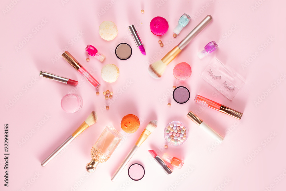 Naklejka premium Make up products and macaroons