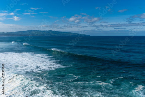 Fototapeta Naklejka Na Ścianę i Meble -  Amazing view of Atlantic Shore at Ribeira Grande. Blue water and clouds. Island of Sao Miguel, Azores Islands, Portugal, Europe