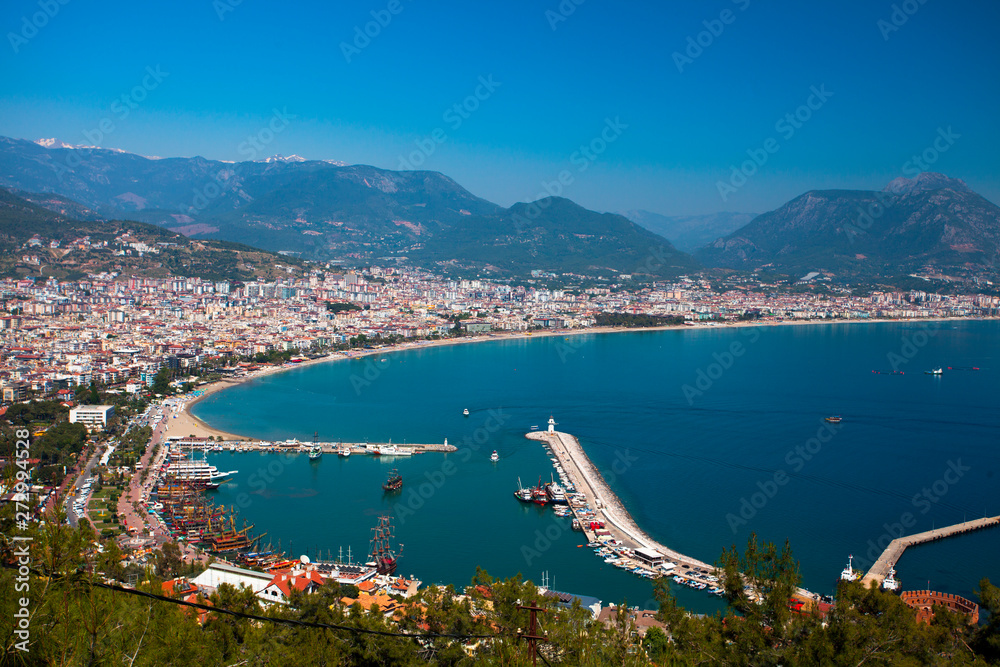 Beautiful view of the Mediterranean Sea, mountains, forest, city, marina and lighthouse.Turkey, Alanya.