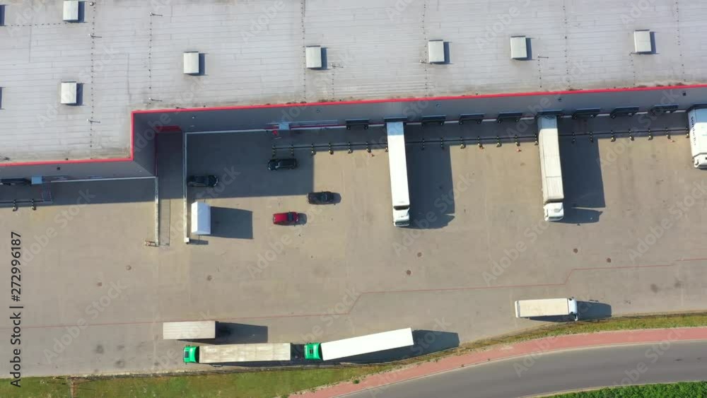 Distribution warehouse with trucks of different capacity. Aerial View Distribution warehouse with trucks of different capacity. Aerial View