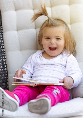 Baby. Girl. Read Book. Cute. Child. Face