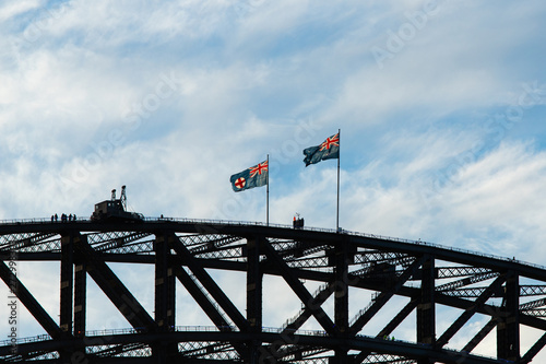 Close-up view of Australia flag fluttering above the Harbour Bridge. © AlexandraDaryl