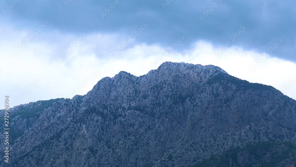 Top of mountains and cloudy rainy sky over hills. Real time full hd video footage. Top of mountains and cloudy rainy sky over hills. Real time full hd video footage.