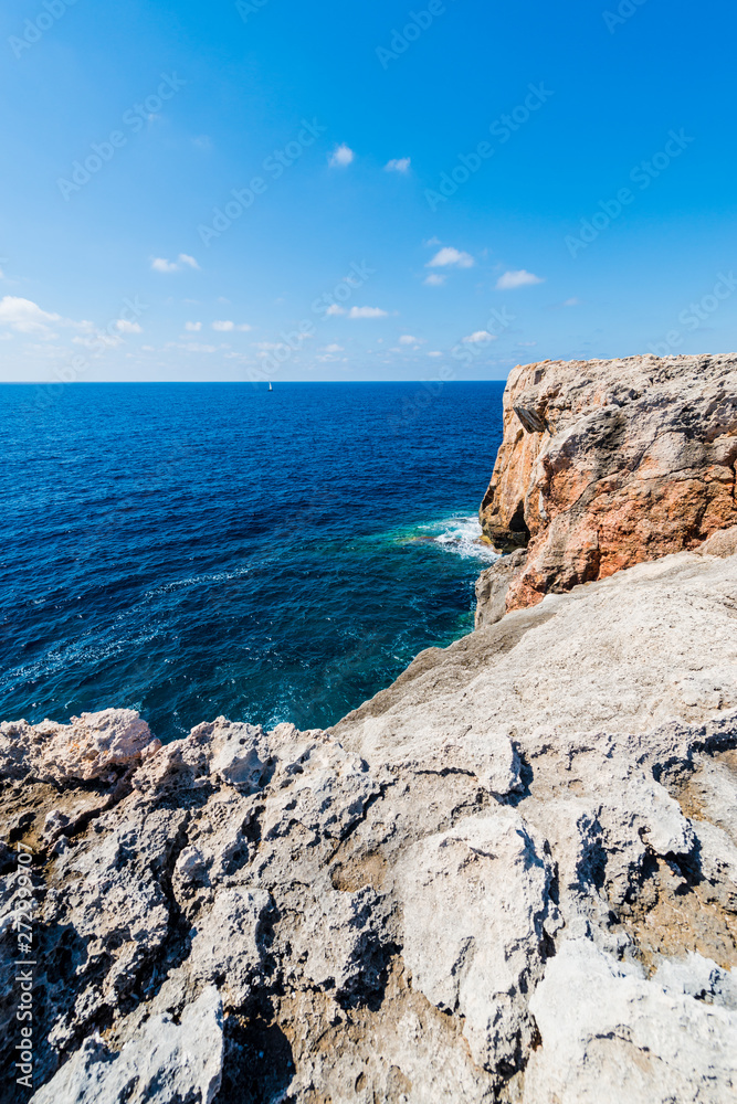 Binidali cliffs in Minorca, Balearic Islands, Spain. Binidali cliffs in Minorca, Balearic Islands, Spain.