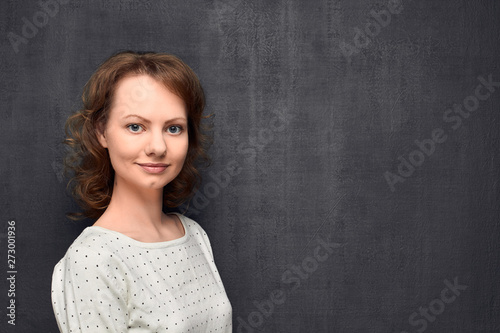 Portrait of cute girl smiling slightly © Andrei Korzhyts