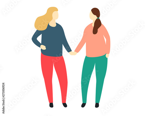 Two girl friends holding hands. Close up view of two women in the front.