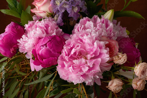 Fototapeta Naklejka Na Ścianę i Meble -  a beautiful bouquet of flowers lilies peonies roses card Wallpaper