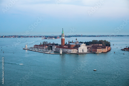 Beautiful super wide-angle aerial view of Venice, Italy with harbor, islands, skyline and scenery beyond the city, seen from the observation tower of St Mark's Campanile