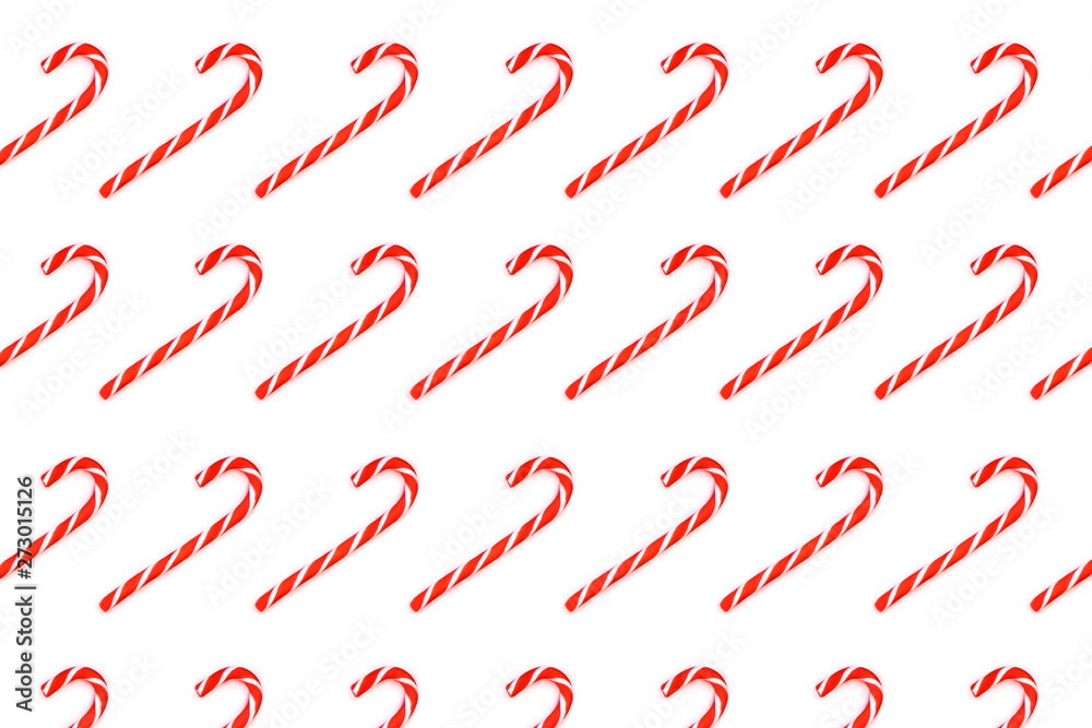 Pattern made from Christmas candy canes isolated on white. Pattern made from Christmas candy canes isolated on white.