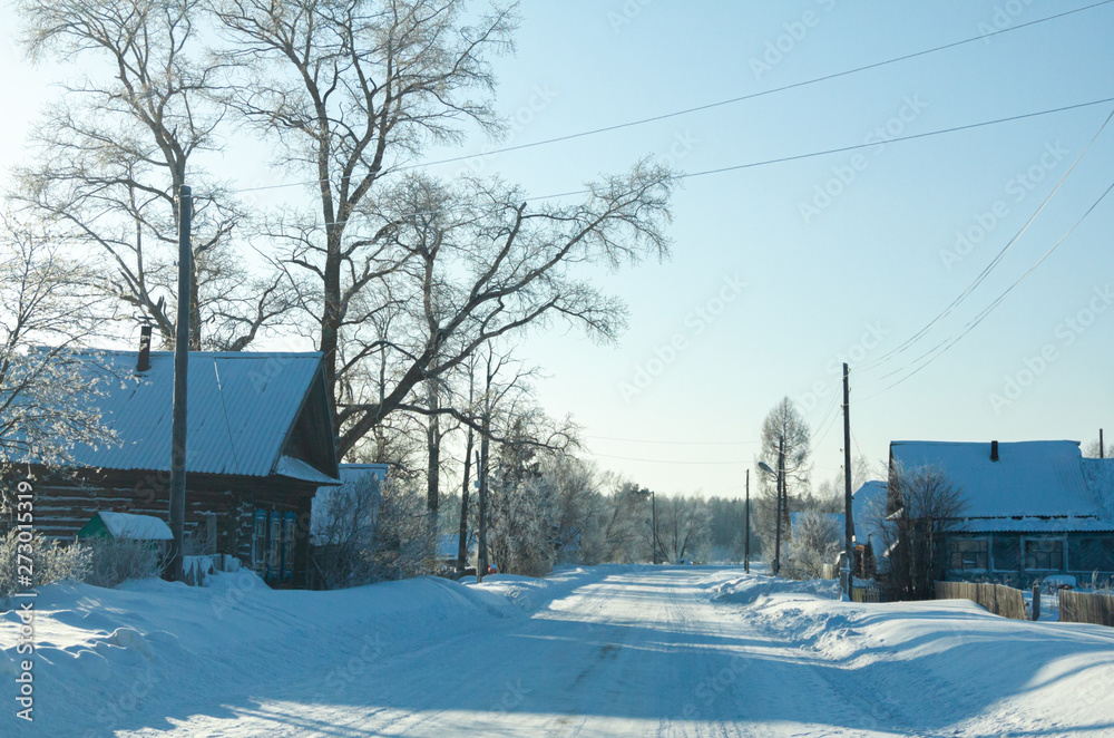 Winter rural highway in frosty day