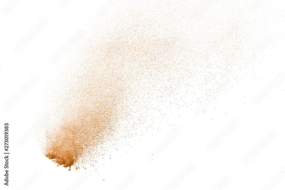 Fototapeta premium Explosion of brown powder on white background.