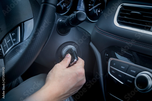 interior of a car,  start engine using a key. © duan