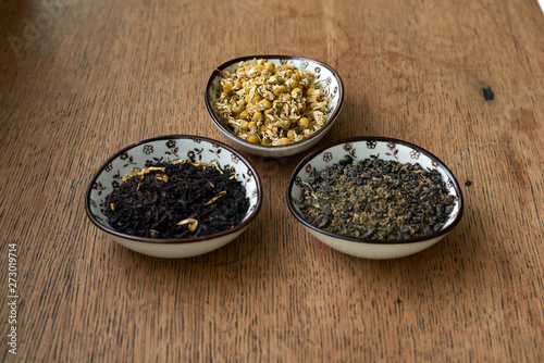 Earl Grey and Chamomile tea on a wooden table 