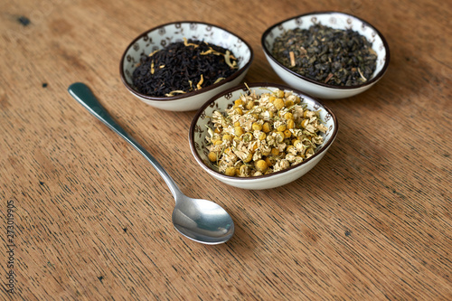 Earl Grey and Chamomile tea on a wooden table 