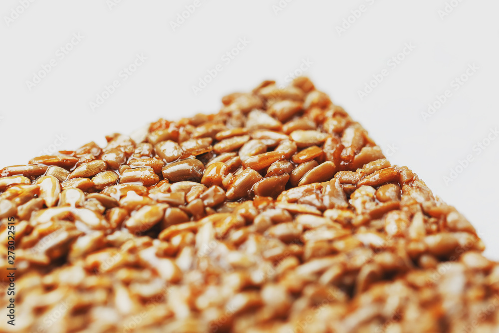 Obraz premium Healthy snacks. Fitness diet food. Kozinaki fritter, seeds, energy bars. White background top view. Isolate, Copy Space
