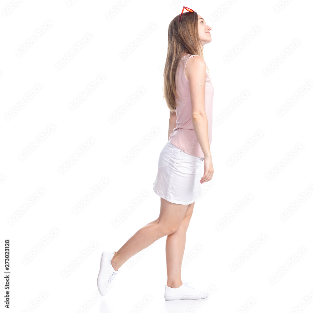 Woman in skirt with sunglasses goes walking smiling happiness on white background isolation Woman in skirt with sunglasses goes walking smiling happiness on white background isolation