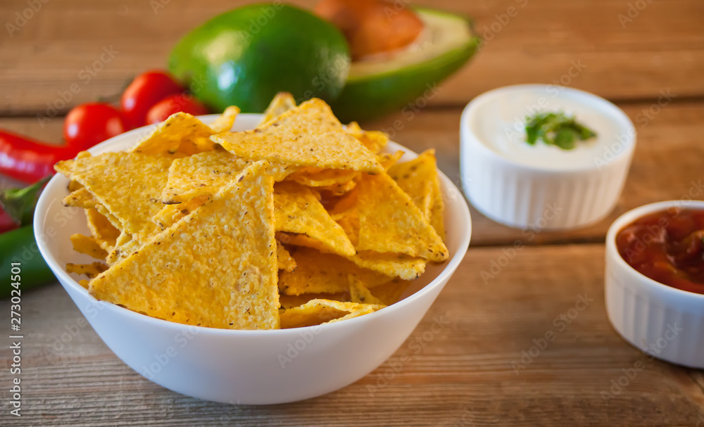 Mexican corn chips nachos with salsa dip Mexican corn chips nachos with salsa dip