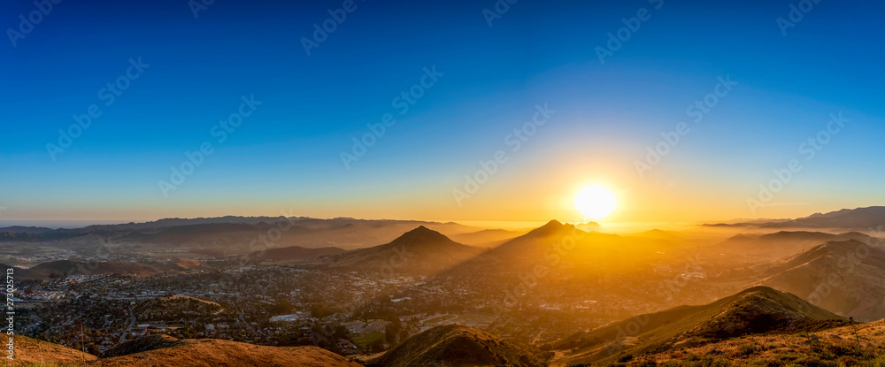Panorama of Sunset over Mountains, City