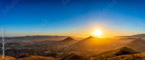 Panorama of Sunset over Mountains, City