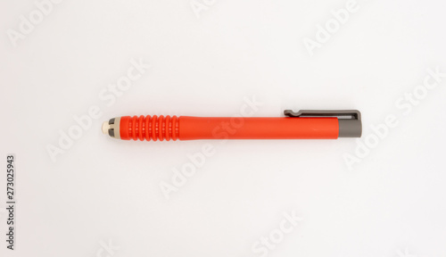 Pen shaped white eraser in red color isolated on white