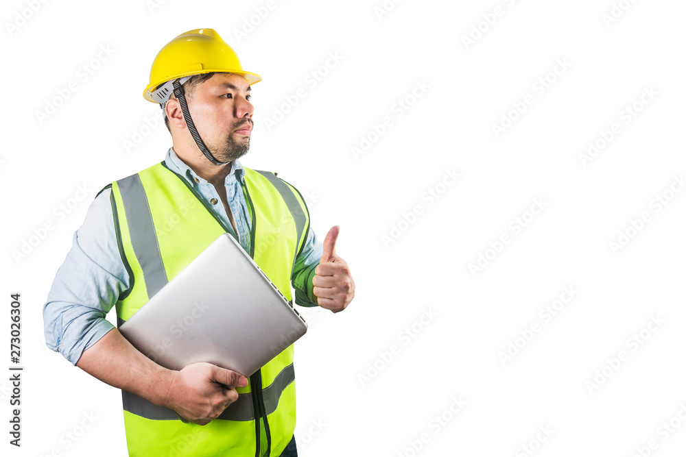 Young construction workers in hard hats on Young construction workers in hard hats on