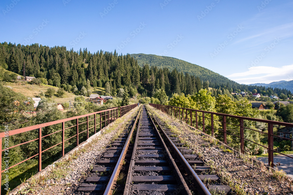 Rail tracks in the mountains. Railway among beautiful landscape. Rail tracks in the mountains. Railway among beautiful landscape.