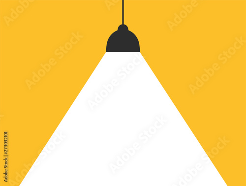 Concept lamp that emits white light on a modern yellow background to add your message. photo