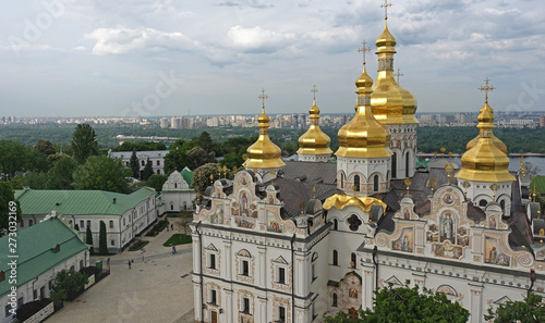 view of the Assumption Cathedral of Kiev-Pechersk Lavra against the background of the city