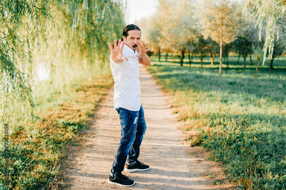 Fototapeta premium Funny italian man posing at nature.