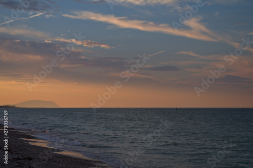 sunset over the sea Adriatic cea Italy seascape nature clouds horizon coast  beautiful orange waves  evening   