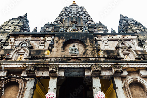 Front of Mahabodhi Temple that view from below while raining at Bodh Gaya, Bihar, India photo