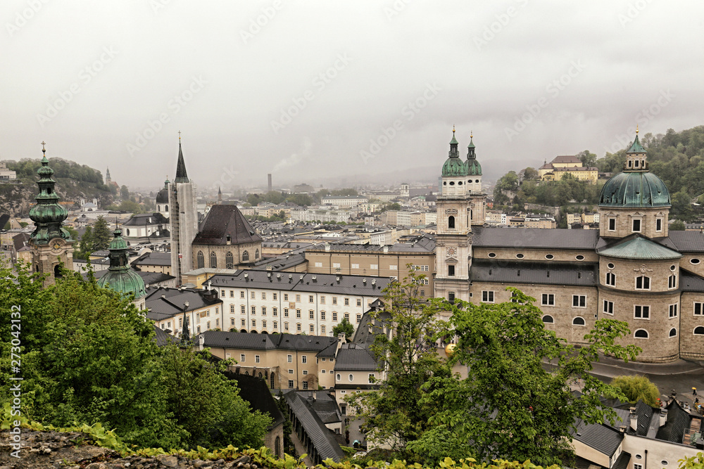 City of Salzburg centre with church on rainy day