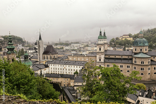 City of Salzburg centre with church on rainy day © ondrejschaumann