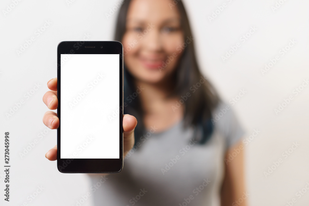 Close up hand holding black phone on white clipping path inside