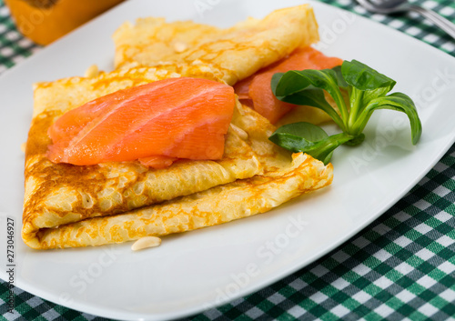 Delicious pancakes with salted salmon