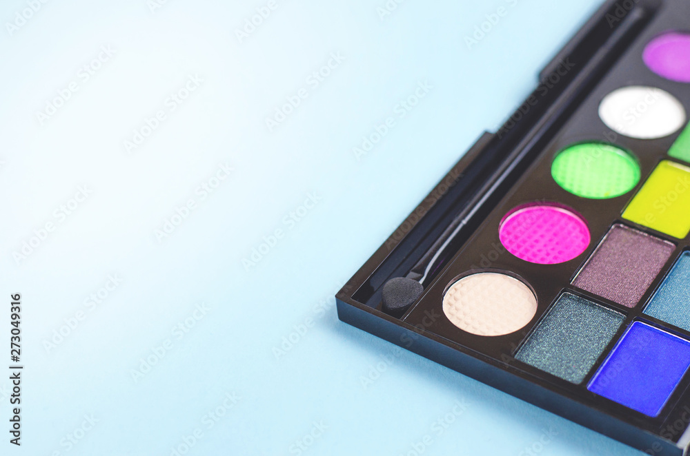 Neon palette of shadows on a blue background. Neon palette of shadows on a blue background.
